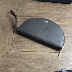 H by Halston Semi-Circle Black Wristlet